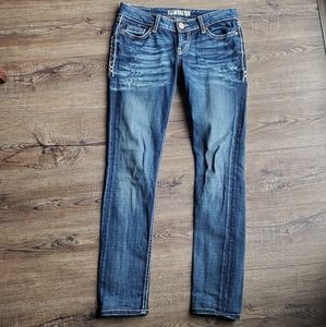 Buckle Skinny Jeans